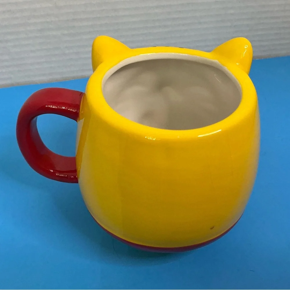 Playful Yellow Cat Face Ceramic Mug with Red Handle